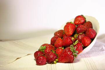 Bowl with ripe big strawberries. Copy space.