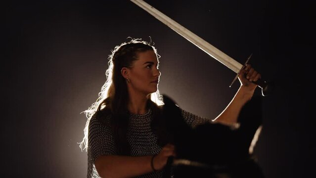 Woman Warrior Riding Horse In Studio