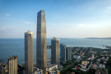 Fototapeta premium Aerial photography of modern architecture along the urban coastline of Qingdao