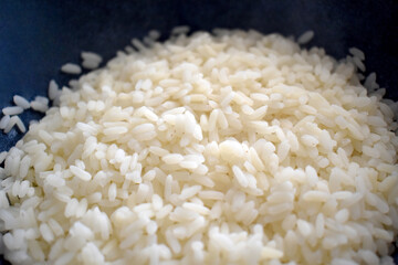 Parboiled rice in a bowl.