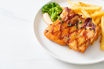 grilled chicken steak with potato chips or french fries