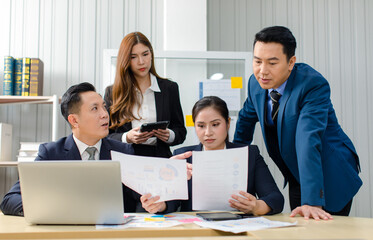 Asian professional successful male female businessmen businesswomen in formal business suit sitting standing talking in video call meeting online in laptop notebook computer