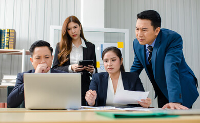 Asian professional successful male female businessmen businesswomen in formal business suit sitting standing talking in video call meeting online in laptop notebook computer