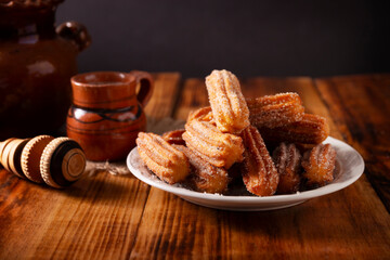 Churros. Fried wheat flour dough, a very popular sweet snack in Spain, Mexico and other countries where it is customary to eat them for breakfast or snack accompanied by hot chocolate or coffee.