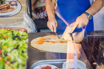 Balik ekmek - fish in a bread, traditional Turkish fast food. Istanbul, Turkey