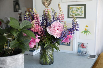 Bouquet with peonies and lupins