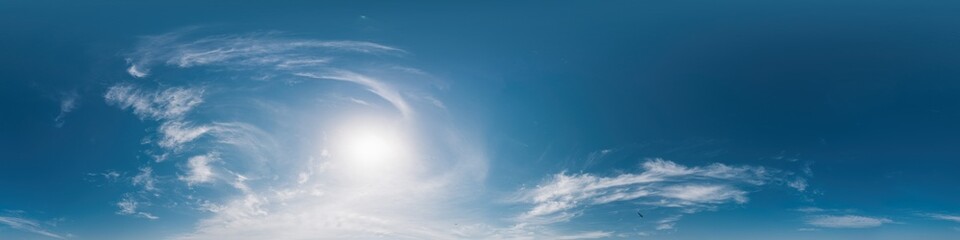 Blue summer sky dome panorama with clouds, no ground, suitable for easy use in 3D graphics and composite aerial and ground panoramas, seamless and perfect for sky replacement.