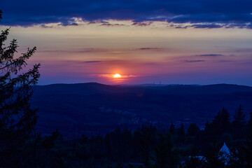 Obraz premium sunset over the mountain range of the Rothaargsteig close to Luetzel