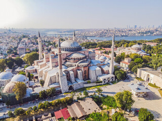 Fototapeta na wymiar Sunny day architecture and Hagia Sophia Museum, in Eminonu, istanbul, Turkey. Turkiye. Dron photography