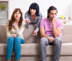 Young family and mother-in-law in family issues concept