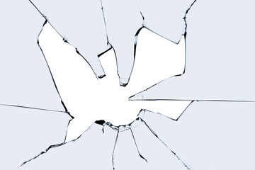 A broken window with cracks and pieces of sharp glass. Cracked texture for design