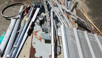 Pile of scrap metal at refuse dump recycle at abandoned courtyard