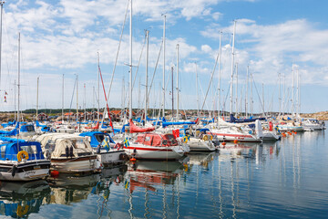 Fototapeta premium Marina with leisure boats on the coast