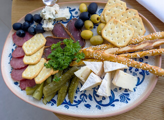 Sausage, cheese, olives and cookies