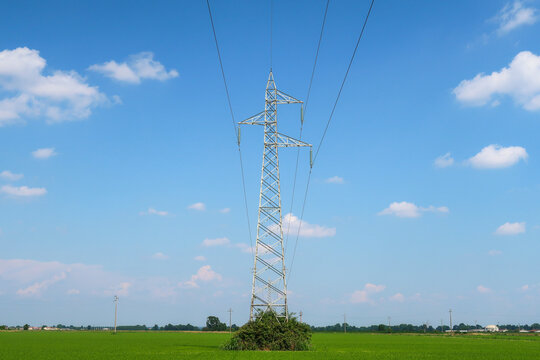 Electricity pylon pole landscape blue sky sun backlight current electricity
