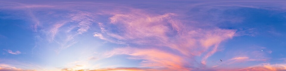 Sunset sky panorama with bright glowing pink Cirrus clouds. HDR 360 seamless spherical panorama. Full zenith or sky dome for 3D visualization, sky replacement for aerial drone panoramas.