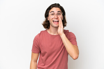 Young handsome man isolated on white background with surprise and shocked facial expression