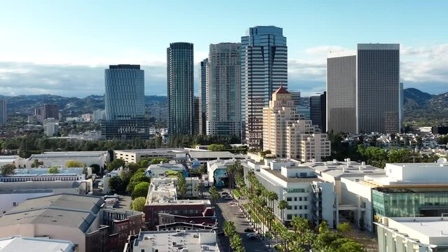 Drone shot rising over Century City in Los Angeles with Fox Studios