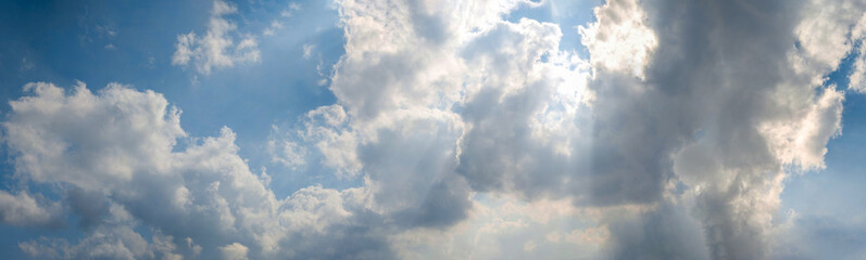 Obraz premium Blue sky with white clouds in the background. Panorama