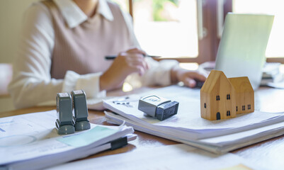 Approved stamp with Business people signing contract making deal with real estate consultant home insurance.Real estate investment Property insurance security offer house.