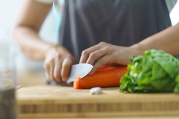 Prepare food  woman is preparing vegetable salad in the kitchen Healthy Food Healthy Cooking