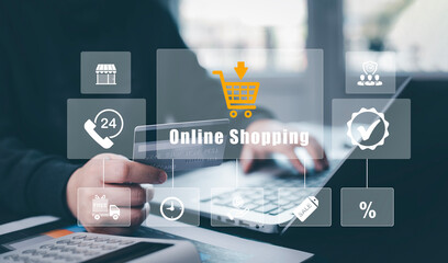 Man using a laptop with typing on a keyboard with online shopping concept, Shopping cart part of the network in hand, Innovation in eCommerce, Online shopping business with selecting shopping cart.