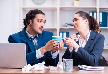 Two employees suffering at workplace