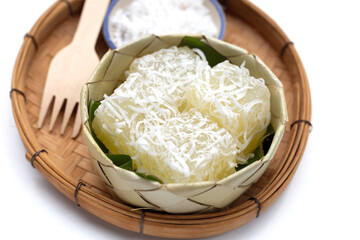 Steamed tapioca cake or cassava cake with grated coconut