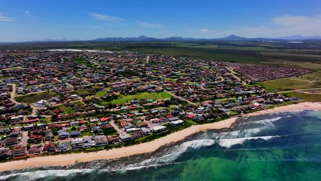 South Africa JBAY Jeffreys Bay aerial drone town homesmost stunning white sand beach epic surf wave saturated aqua blue rugged reef coastline daytime WSL Corona Open Supers Boneyard summer to right