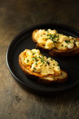 Homemade scrambled eggs on toast