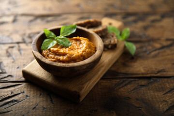 Roasted vegetable dip served with bread