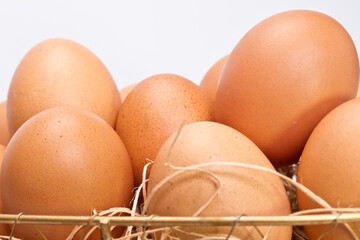 Brown Eggs in Metal Basket Closeup