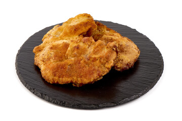 Homemade breaded chicken Wiener schnitzel, isolated on white background