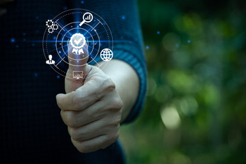 Hand thump up with the sign of the top service Quality assurance, Guarantee, Standards, ISO...