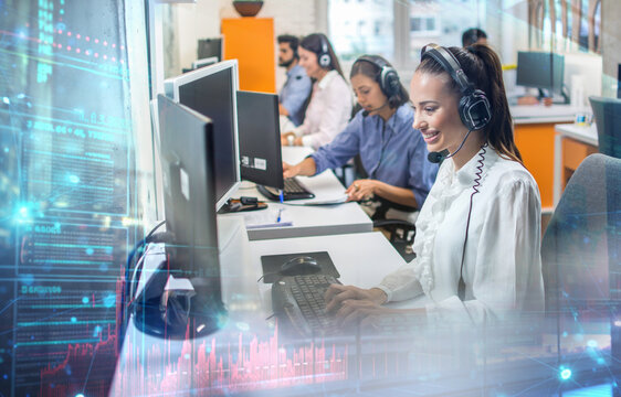 Friendly helpline operators working in call center. Business, Technology, Internet and network concept.