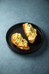 Homemade scrambled eggs on toast