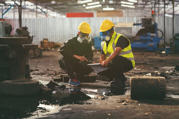 Chemical leak and safety first concept. Group of chemical specialist wear safety uniform, gas mask...