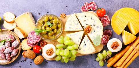 assorted of cheese and snacks