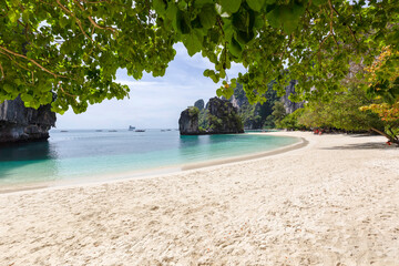 Beautiful tropical white beach with blue sky and green sea on the Koh Hong islands in the Andaman Sea off the coast of Krabi, Thailand