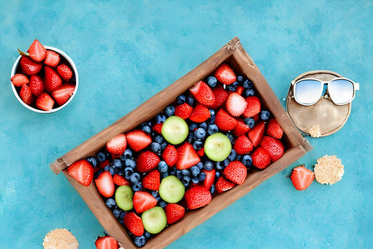 Ripe strawberries, beach essentials, pure relaxation, simple pleasures.