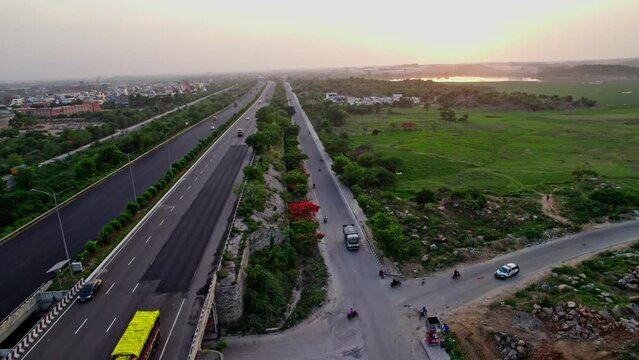 hyderabad outer ring road during sunset top drone view 4k 30p