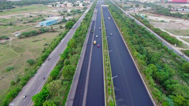 vehicles going in the express highway drone follow shot 4k 30p