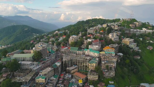 Aerial top view of Muree village, Islamabad with residential local houses, nature trees, Pakistan in urban city town in Asia, buildings.