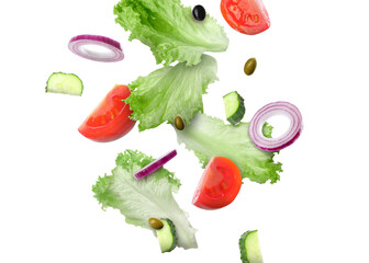 Lettuce leaves, olives, cut cucumber, onion and tomato falling on white background