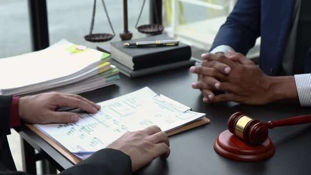 Attorneys who are reading the statute of limitations Consultation between male lawyers and business clients, tax and legal and legal services firms