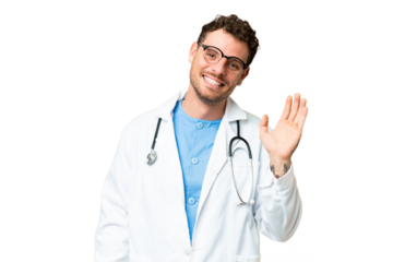 Brazilian doctor man over isolated chroma key background saluting with hand with happy expression
