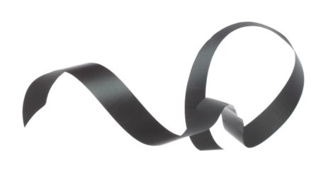 Black ribbon long straight fly in air with curve roll shiny. Black ribbon for present gift birthday party to wrap around decorate and make of textile cloth long straight. White background isolated