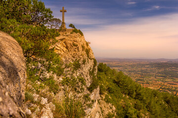 Fototapeta premium The stone cross of Santuario de San Salvador Monastery, Felanitx, Alcudia, Mallorca, Spain