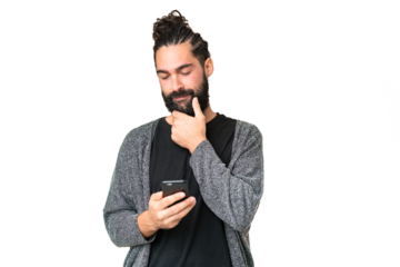 Young man with beard over isolated chroma key background thinking and sending a message