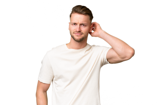 Young blonde caucasian man over isolated background having doubts